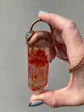 Fire (Hematoid) Quartz ‘Passionate Flame’ pendant with a jewel of Milky Aquamarine